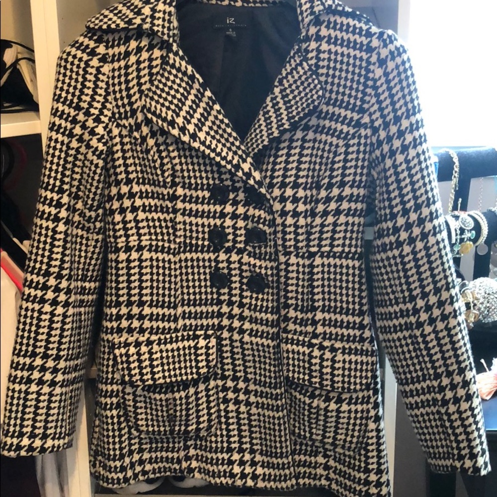 Thigh length black and white stitch peacoat!